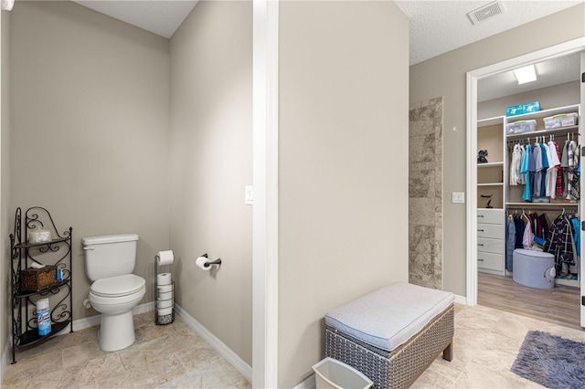 9925 SW 95th Loop, Ocala, FL 34481 - full bathroom with a spacious closet and tiled shower