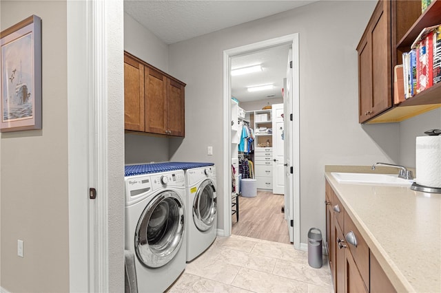 9925 SW 95th Loop, Ocala, FL 34481 - laundry area featuring independent washer and dryer and cabinet space