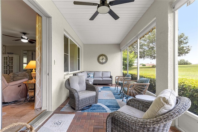 9925 SW 95th Loop, Ocala, FL 34481 - sunroom featuring a ceiling fan, an outdoor living space, and plenty of natural light