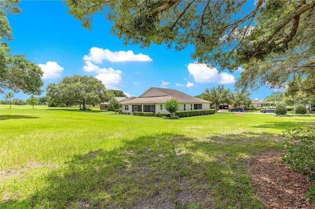 9925 SW 95th Loop, Ocala, FL 34481 - view of green lawn