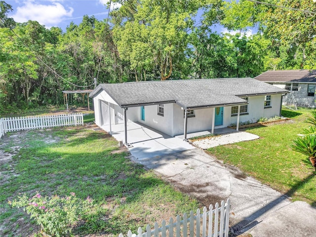 1636 SW 5th Pl, Ocala, FL 34471 - ranch-style house featuring a shingled roof, a carport, driveway, and stucco siding
