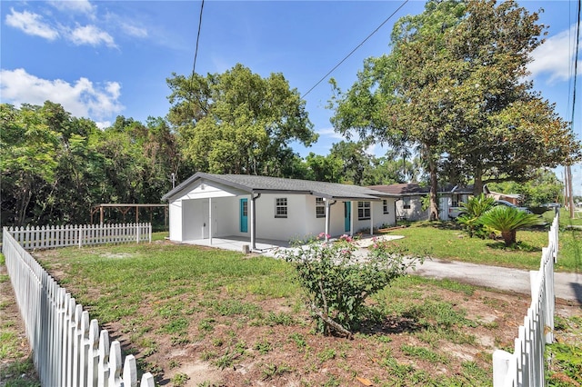1636 SW 5th Pl, Ocala, FL 34471 - view of front facade with stucco siding and a carport