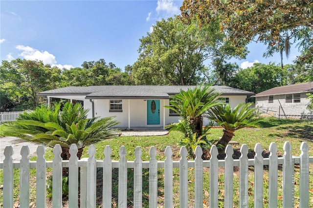 1636 SW 5th Pl, Ocala, FL 34471 - ranch-style home featuring a fenced front yard and stucco siding
