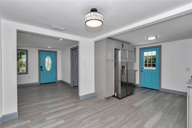 1636 SW 5th Pl, Ocala, FL 34471 - entrance foyer with light wood-type flooring and baseboards