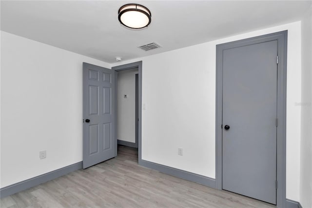 1636 SW 5th Pl, Ocala, FL 34471 - unfurnished bedroom featuring light wood-style floors