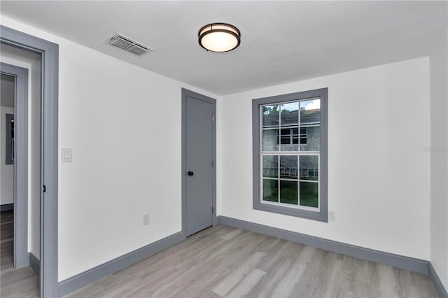 1636 SW 5th Pl, Ocala, FL 34471 - unfurnished room with light wood-type flooring