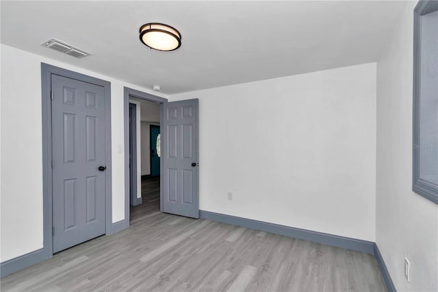 1636 SW 5th Pl, Ocala, FL 34471 - unfurnished bedroom with wood finished floors