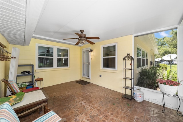 9085 SW 96th Ln Unit B, Ocala, FL 34481 - sunroom featuring ceiling fan