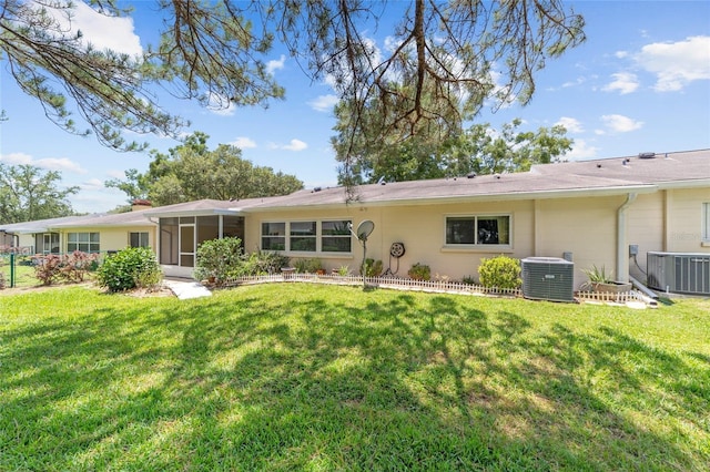 9085 SW 96th Ln Unit B, Ocala, FL 34481 - back of property with a sunroom and concrete block siding