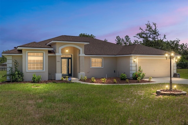 13741 SW 73rd St, Ocala, FL 34481 - single story home featuring an attached garage, stucco siding, concrete driveway, and a shingled roof