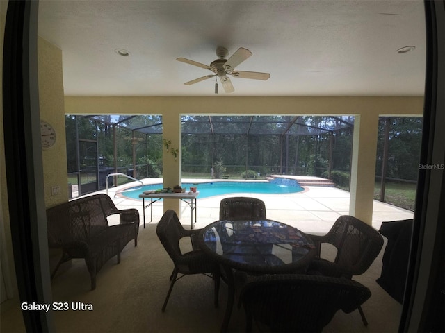 5408 W Corral Pl, Beverly Hills, FL 34465 - swimming pool with a patio, glass enclosure, and a ceiling fan