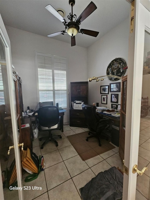 5408 W Corral Pl, Beverly Hills, FL 34465 - home office featuring light tile patterned floors and a ceiling fan