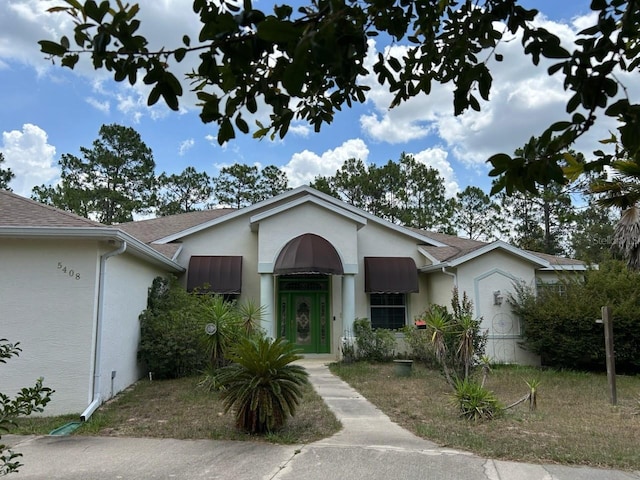 5408 W Corral Pl, Beverly Hills, FL 34465 - single story home featuring stucco siding and roof with shingles