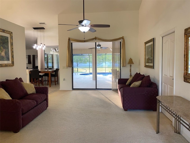9923 SE 64th Ave, Belleview, FL 34420 - carpeted living room with ceiling fan