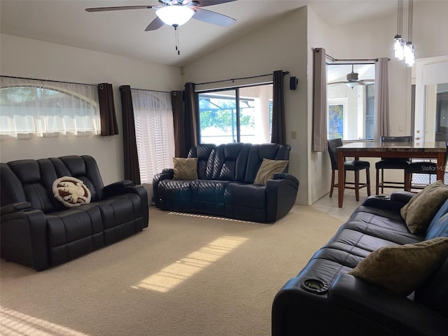 9923 SE 64th Ave, Belleview, FL 34420 - living area with ceiling fan, vaulted ceiling, and light carpet