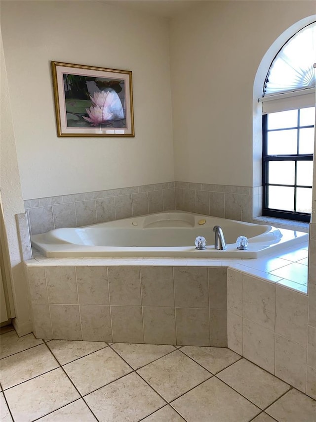 9923 SE 64th Ave, Belleview, FL 34420 - full bathroom with a bath and tile patterned flooring