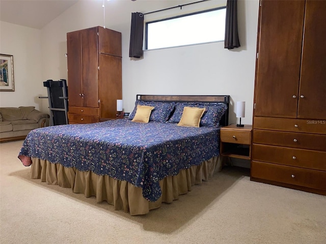 9923 SE 64th Ave, Belleview, FL 34420 - bedroom with light colored carpet and vaulted ceiling