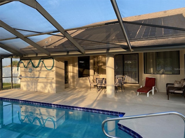 9923 SE 64th Ave, Belleview, FL 34420 - swimming pool with a patio and glass enclosure