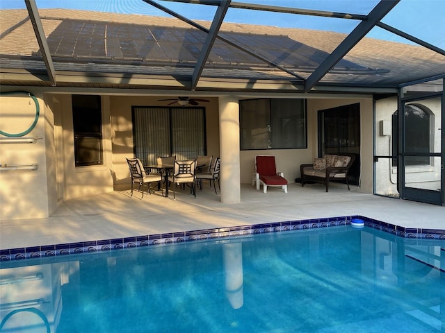 9923 SE 64th Ave, Belleview, FL 34420 - rear view of house with a patio, a ceiling fan, and an outdoor pool