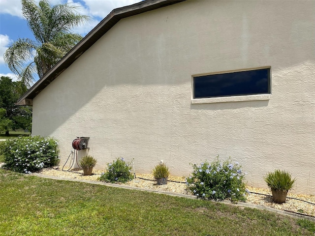 9923 SE 64th Ave, Belleview, FL 34420 - view of side of property with stucco siding