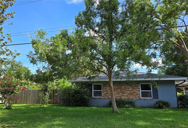 3709 NE 4th St, Ocala, FL 34470 - view of property exterior featuring concrete block siding and roof with shingles