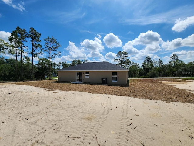 1780 Winding Hills Rd, Dunnellon, FL 34431 - back of property featuring stucco siding