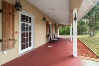 7808 E Savannah Dr, Floral City, FL 34436 - view of porch