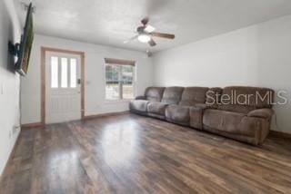 7808 E Savannah Dr, Floral City, FL 34436 - living area featuring wood finished floors and a ceiling fan