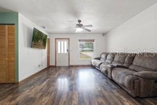 7808 E Savannah Dr, Floral City, FL 34436 - living room featuring wood finished floors and a ceiling fan