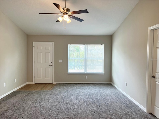 185 Malauka Loop, Ocklawaha, FL 32179 - empty room featuring carpet floors and ceiling fan