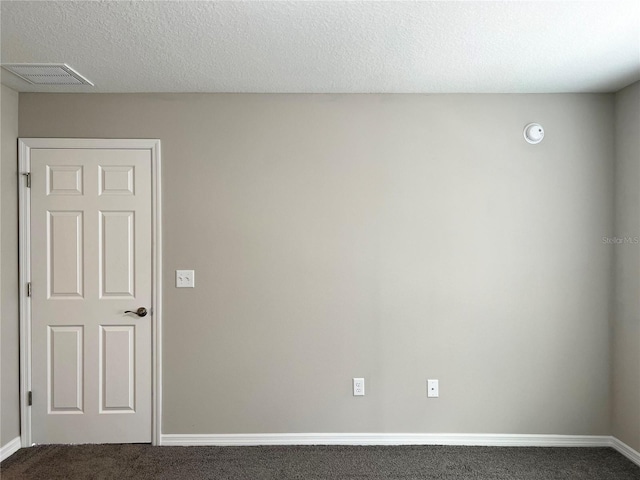 185 Malauka Loop, Ocklawaha, FL 32179 - empty room featuring dark colored carpet and a smoke detector