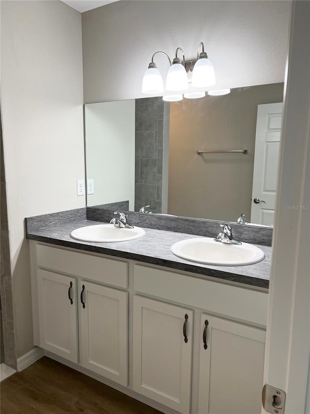 185 Malauka Loop, Ocklawaha, FL 32179 - full bathroom featuring double vanity and wood finished floors