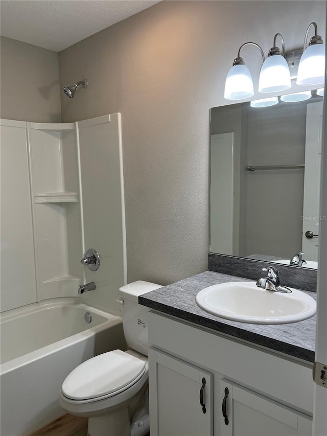 185 Malauka Loop, Ocklawaha, FL 32179 - full bath with vanity, tub / shower combination, and a textured ceiling
