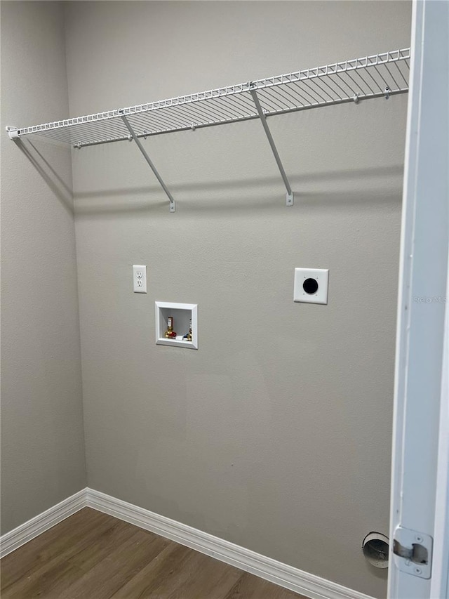 185 Malauka Loop, Ocklawaha, FL 32179 - laundry area featuring hookup for an electric dryer, hookup for a washing machine, and dark wood-style floors