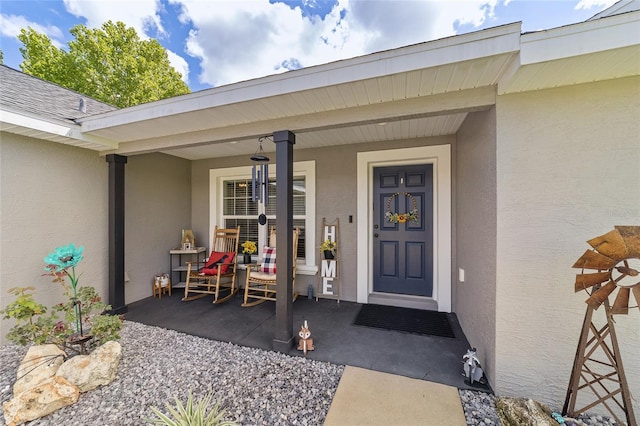 7435 N Nature Trl, Hernando, FL 34442 - property entrance featuring stucco siding and a porch