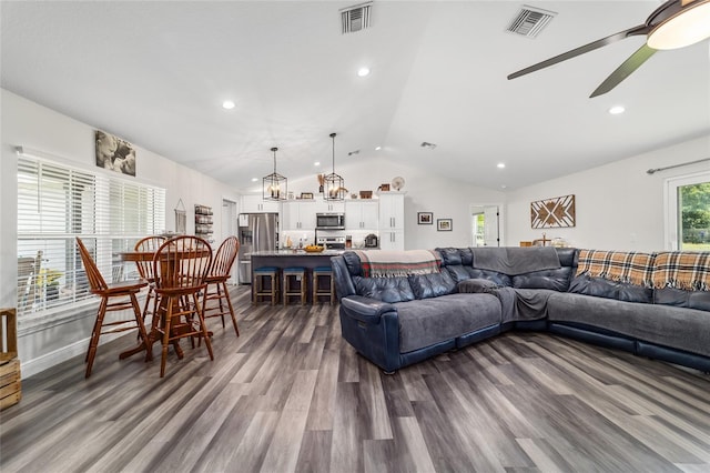 7435 N Nature Trl, Hernando, FL 34442 - living room with lofted ceiling, dark wood finished floors, a ceiling fan, and recessed lighting