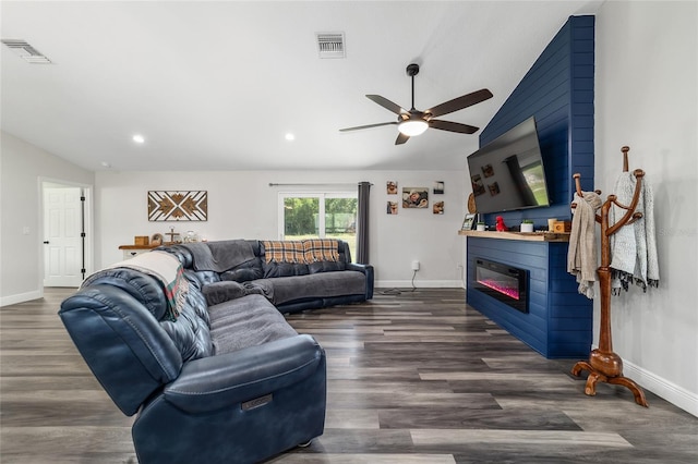 7435 N Nature Trl, Hernando, FL 34442 - living room featuring vaulted ceiling, a ceiling fan, wood finished floors, a glass covered fireplace, and recessed lighting