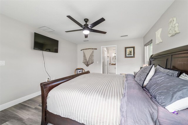 7435 N Nature Trl, Hernando, FL 34442 - bedroom with wood finished floors, ceiling fan, and connected bathroom