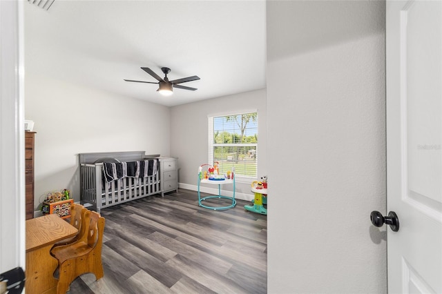 7435 N Nature Trl, Hernando, FL 34442 - bedroom with a nursery area, wood finished floors, and ceiling fan