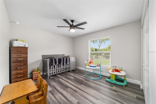 7435 N Nature Trl, Hernando, FL 34442 - bedroom featuring wood finished floors, a ceiling fan, a nursery area, and a closet