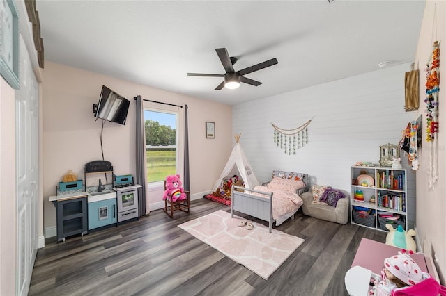 7435 N Nature Trl, Hernando, FL 34442 - bedroom featuring wood finished floors, a ceiling fan, and wood walls