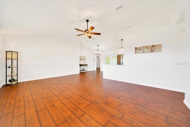 6142 SE 37th Ter, Ocala, FL 34480 - unfurnished living room with ceiling fan, lofted ceiling, a chandelier, and wood finished floors