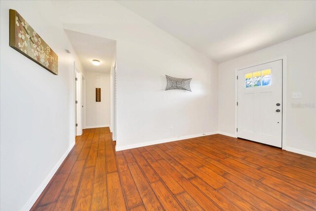 6142 SE 37th Ter, Ocala, FL 34480 - foyer entrance featuring hardwood / wood-style flooring and baseboards