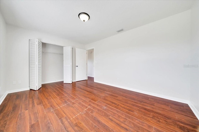 6142 SE 37th Ter, Ocala, FL 34480 - unfurnished bedroom with wood finished floors and a closet