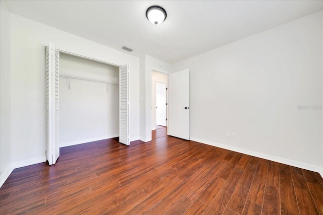 6142 SE 37th Ter, Ocala, FL 34480 - unfurnished bedroom with wood finished floors and a closet