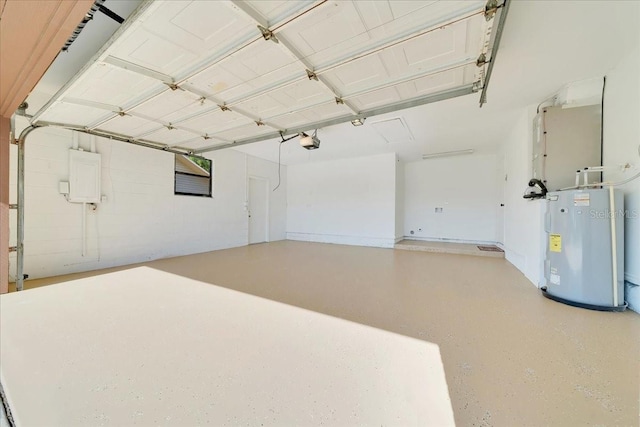 6142 SE 37th Ter, Ocala, FL 34480 - garage featuring a garage door opener and electric water heater