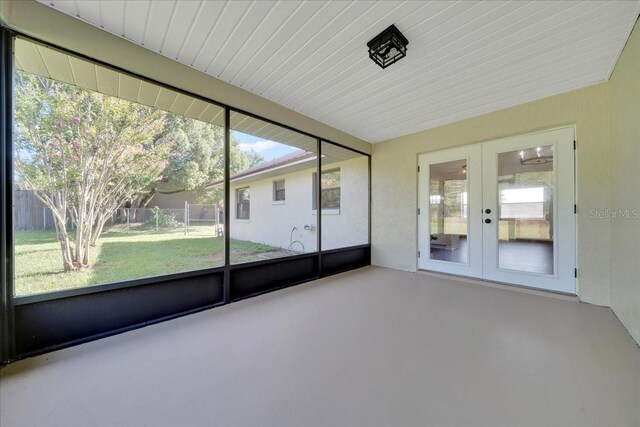 6142 SE 37th Ter, Ocala, FL 34480 - unfurnished sunroom featuring french doors