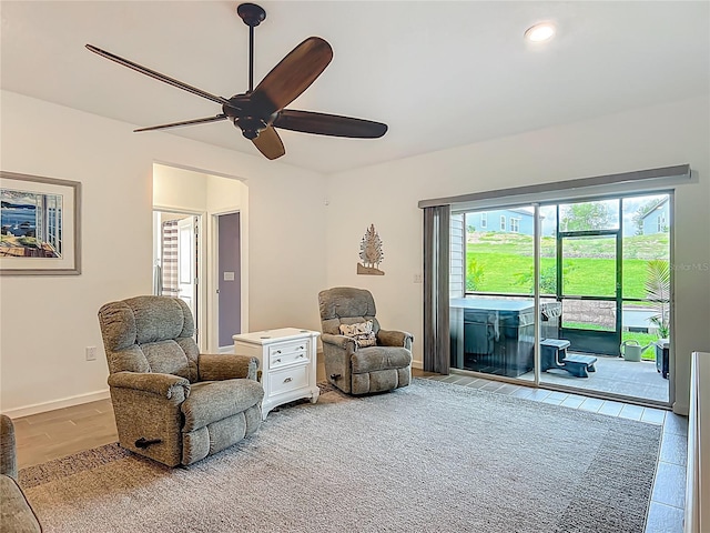 19424 SW 77th Loop, Dunnellon, FL 34432 - living area featuring ceiling fan and baseboards