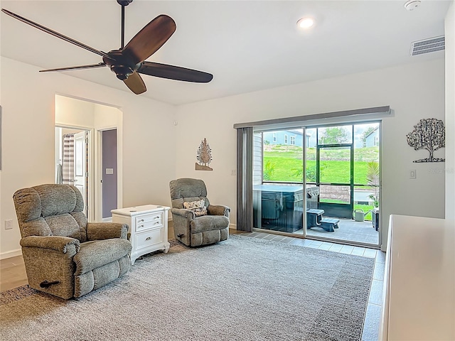 19424 SW 77th Loop, Dunnellon, FL 34432 - living area with a ceiling fan and baseboards
