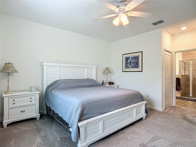 19424 SW 77th Loop, Dunnellon, FL 34432 - carpeted bedroom featuring ceiling fan and connected bathroom